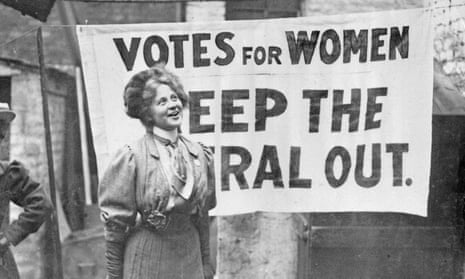 Suffragette with 'Votes for Women — Keep the Liberal Out' banner